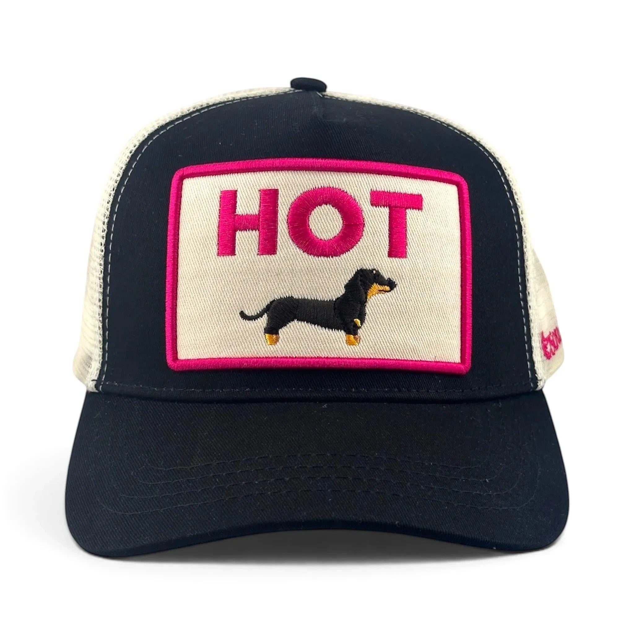 Soulbyrd Wholesale black trucker hat with a hot dog dachshund patch, cotton twill crown, and adjustable snapback.