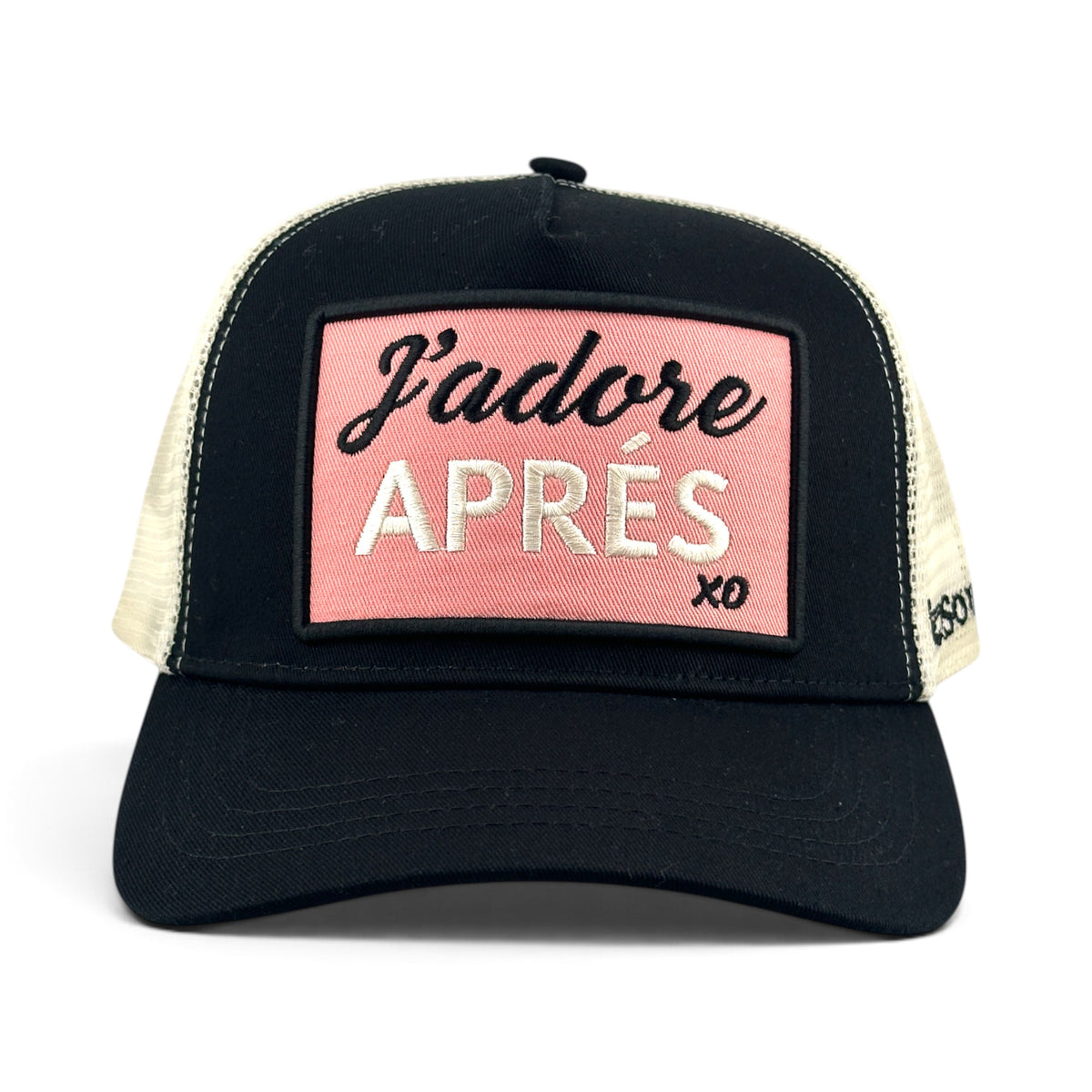 Soulbyrd Wholesale black trucker hat with a pink rectangular patch featuring J'adore APRÉS text and mesh back.