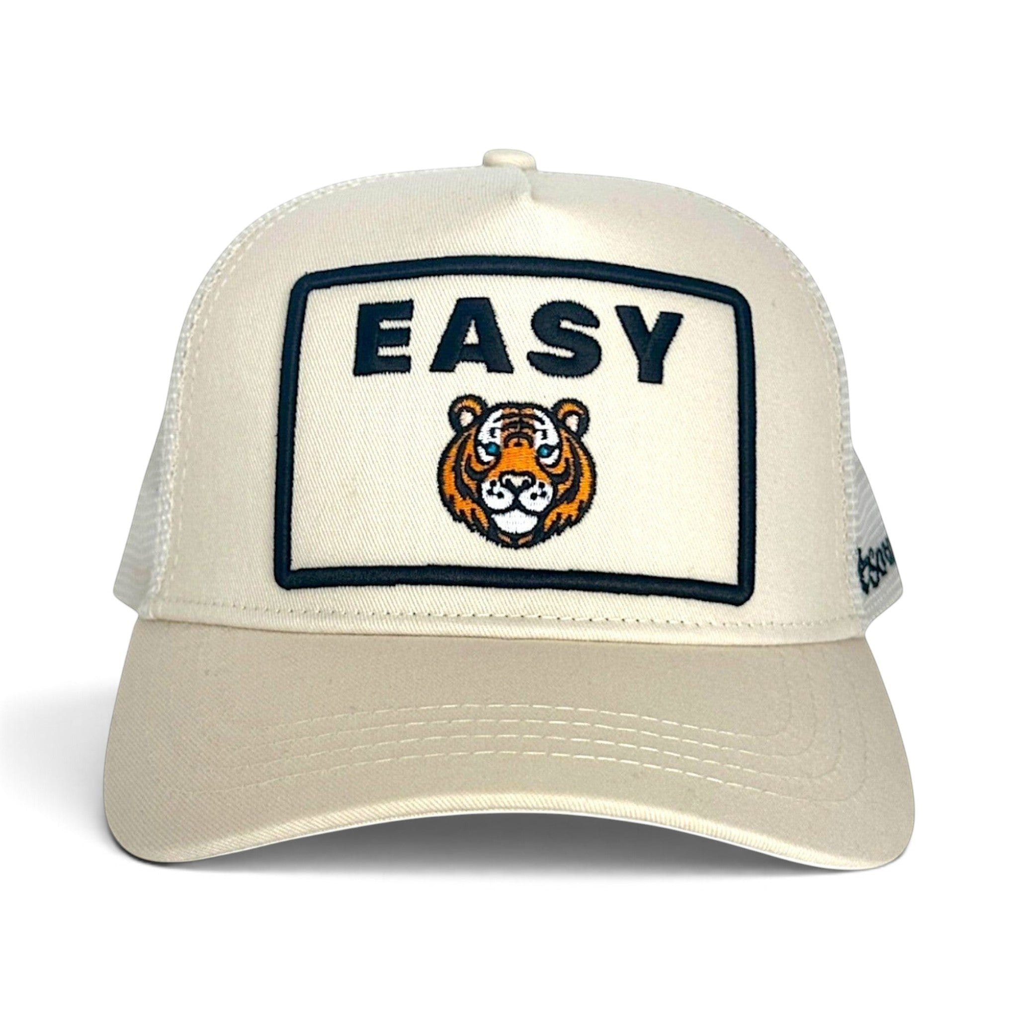 Soulbyrd Wholesale cream 5-panel trucker hat with cotton twill front, nylon mesh back, and Easy Tiger tiger patch.