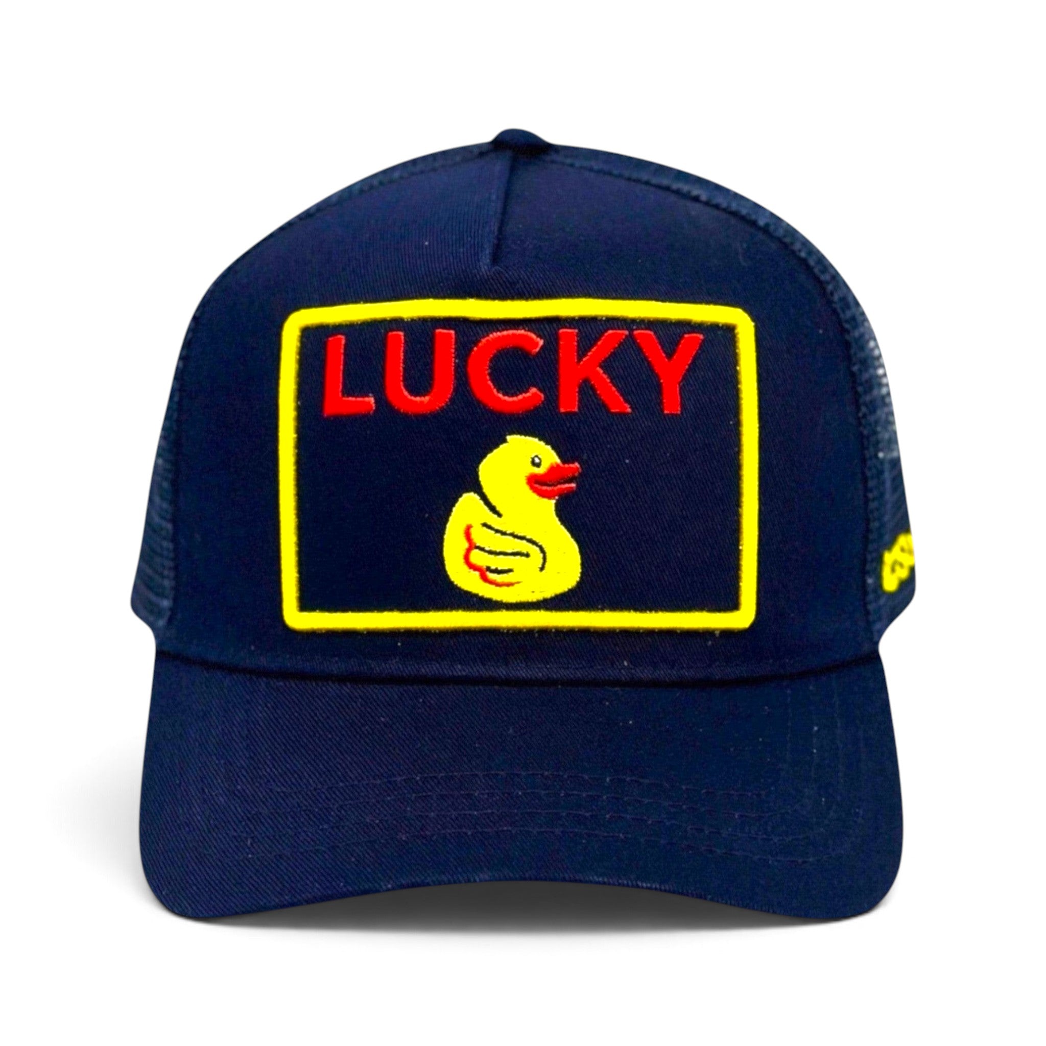 Soulbyrd Wholesale indigo cotton trucker hat with a yellow and red Lucky Duck embroidered patch and snapback closure.