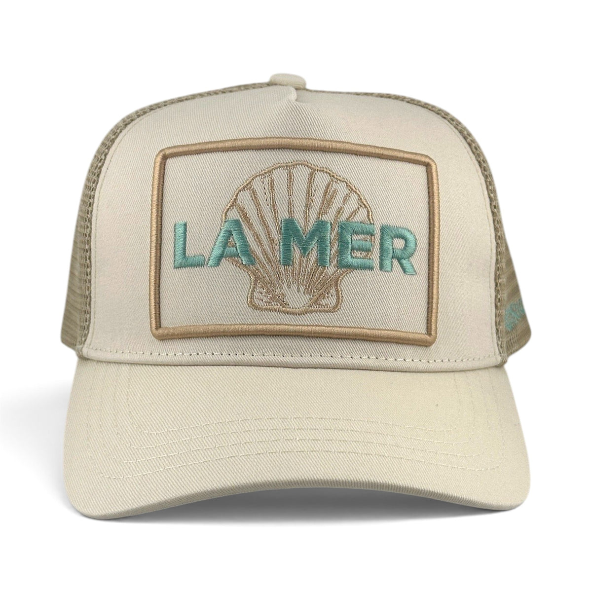 Soulbyrd Wholesale La Mer cream trucker hat with cotton twill front, nylon mesh back, and shell embroidery.