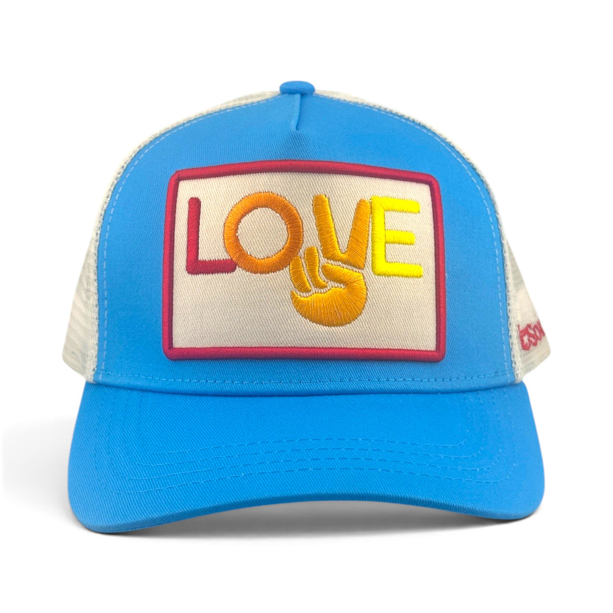 Soulbyrd Wholesale turquoise trucker hat with a cream patch featuring colorful LOVE embroidery and a peace sign