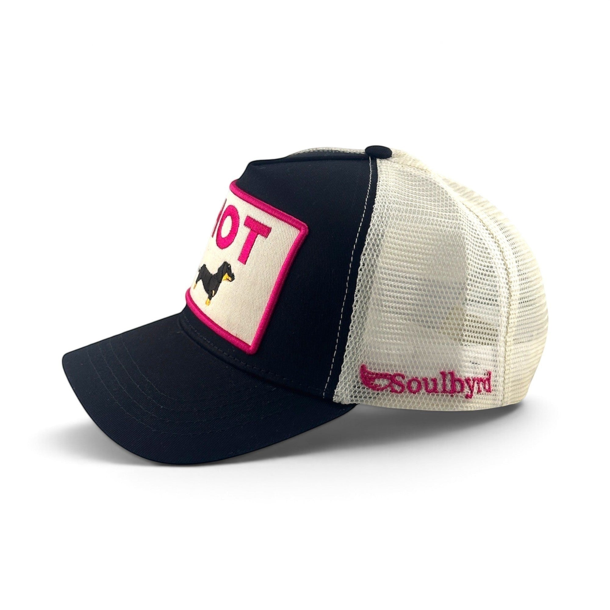 Soulbyrd Wholesale black trucker hat with cotton twill front, nylon mesh back, and a hot dog patch on the crown.