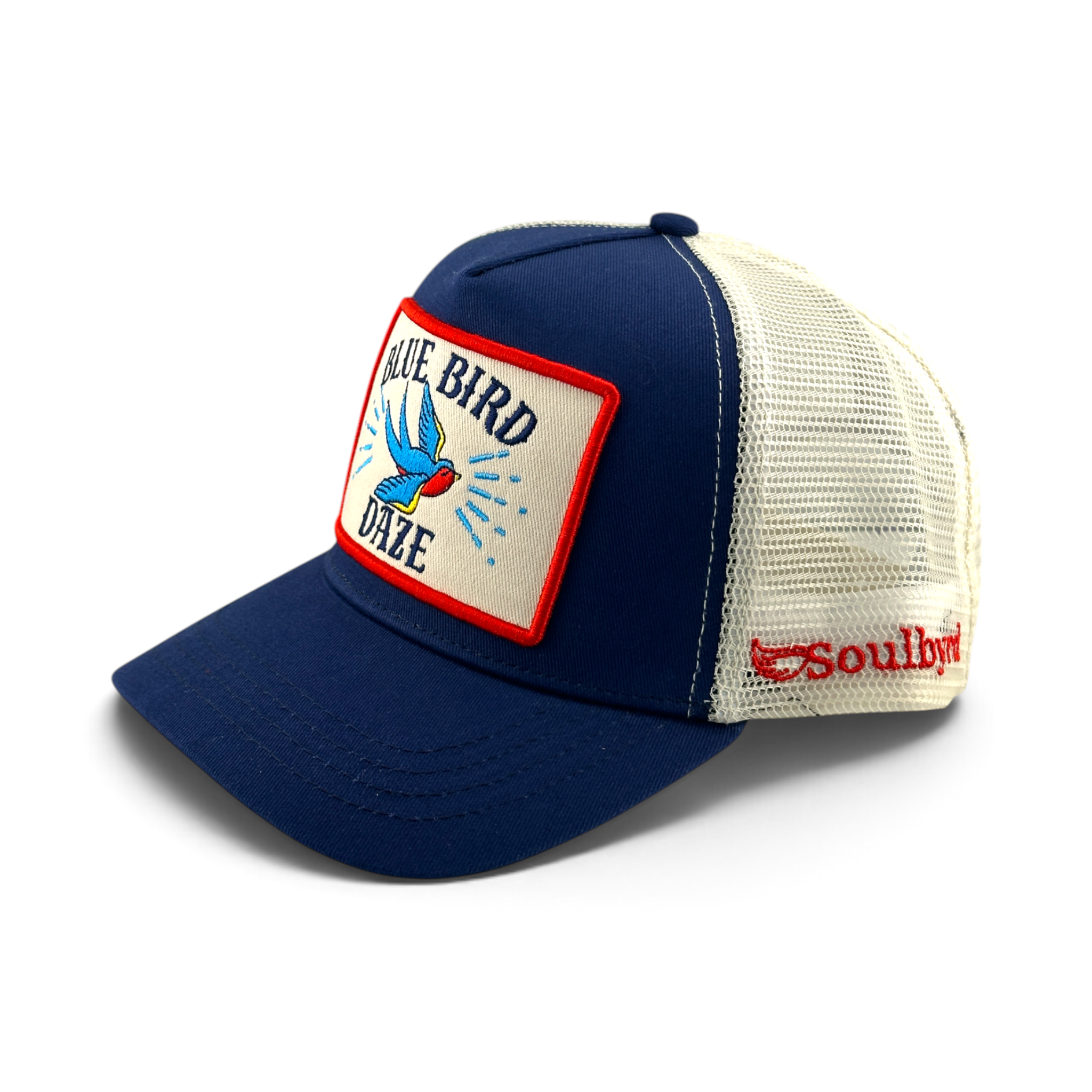Soulbyrd Wholesale blue 5-panel trucker hat with white mesh back, cotton twill crown, and Blue Bird Daze patch