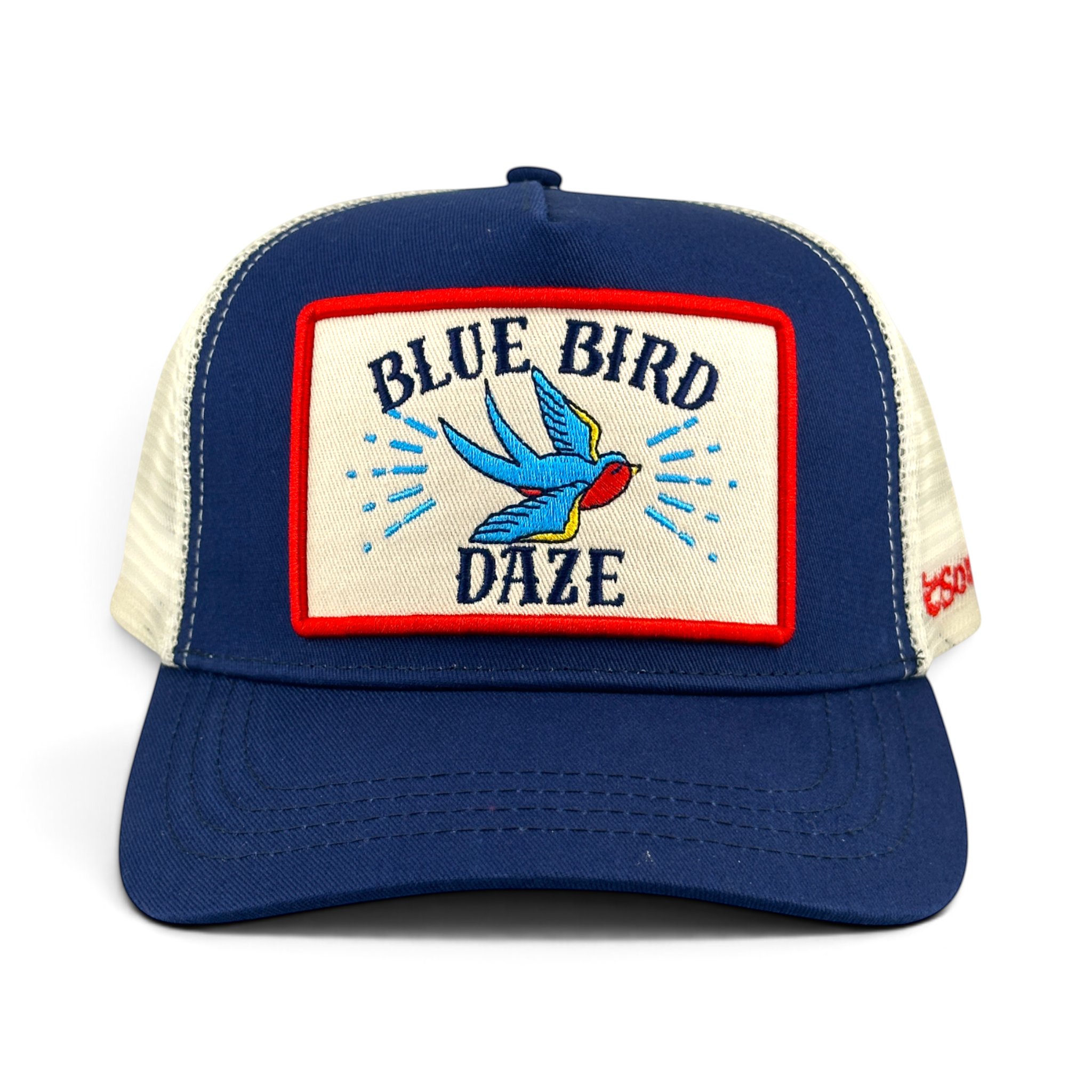 Soulbyrd Wholesale blue 5-panel trucker hat with cotton twill front, nylon mesh back, and Blue Bird Daze patch.