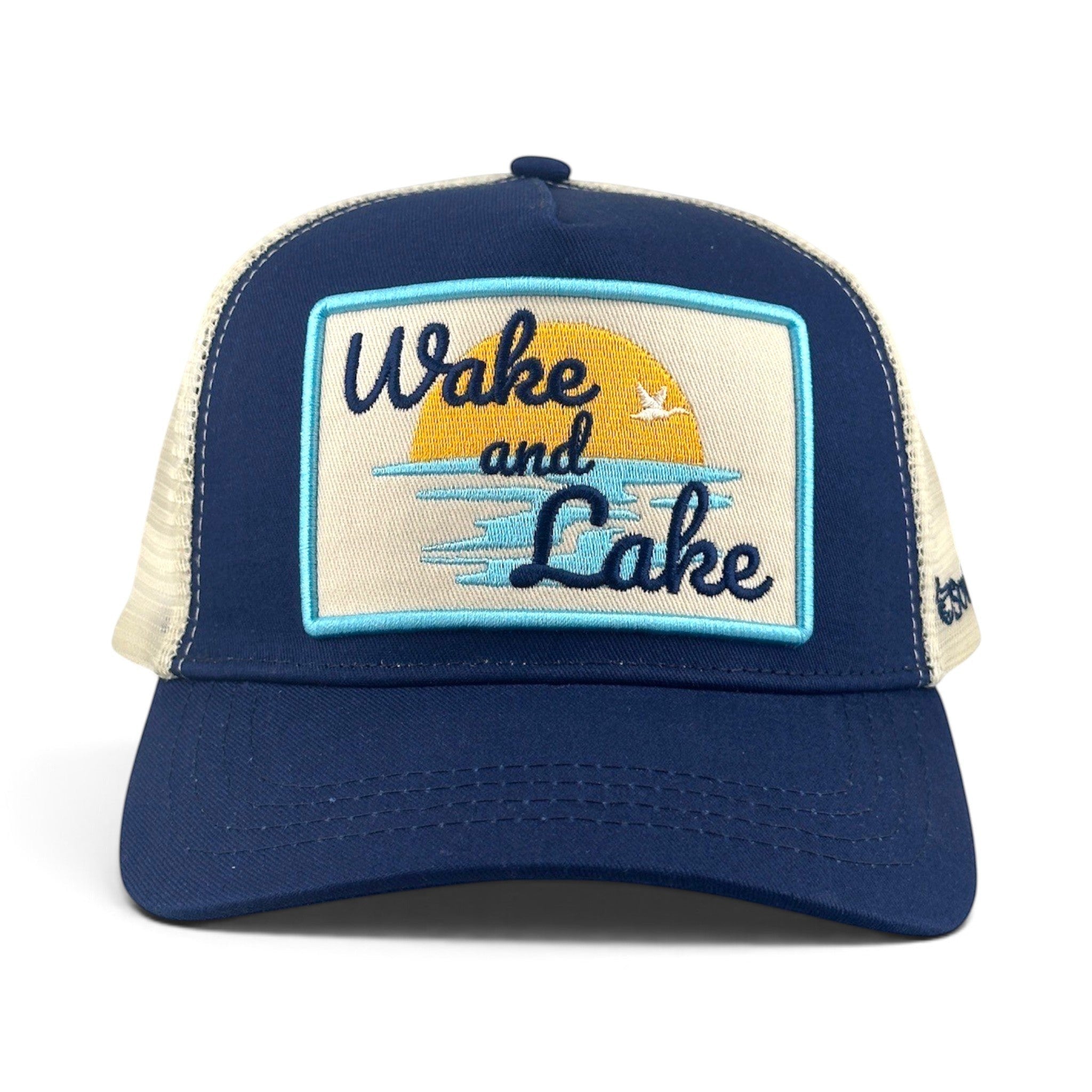 Soulbyrd Wholesale blue 5-panel trucker hat with cotton twill front and mesh back featuring Wake & Lake patch