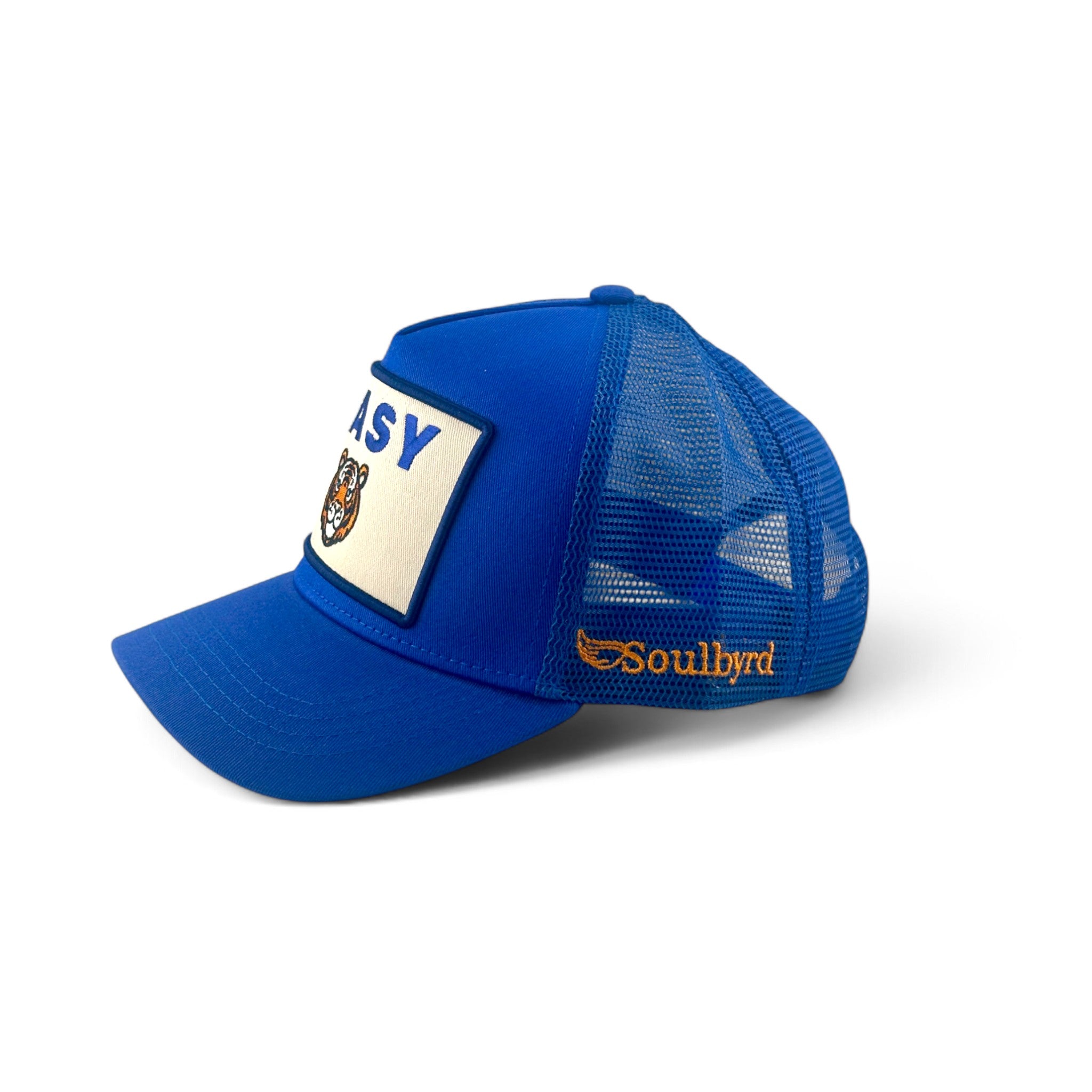 Soulbyrd Wholesale blue 5-panel trucker hat with cotton twill crown, nylon mesh back, and Easy Tiger patch.