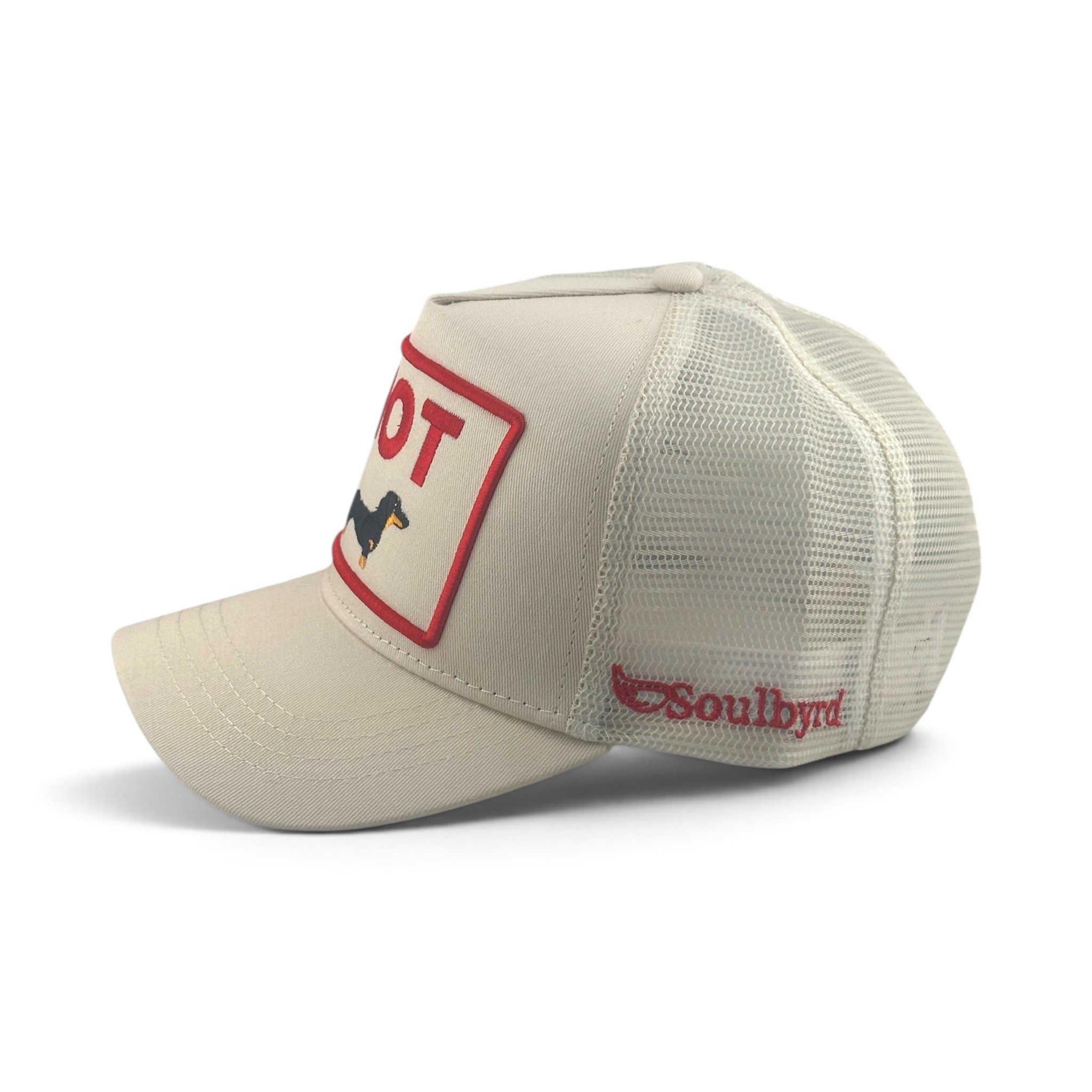 Soulbyrd Wholesale cream trucker hat with a hot dog graphic patch, cotton twill front, and nylon mesh back.