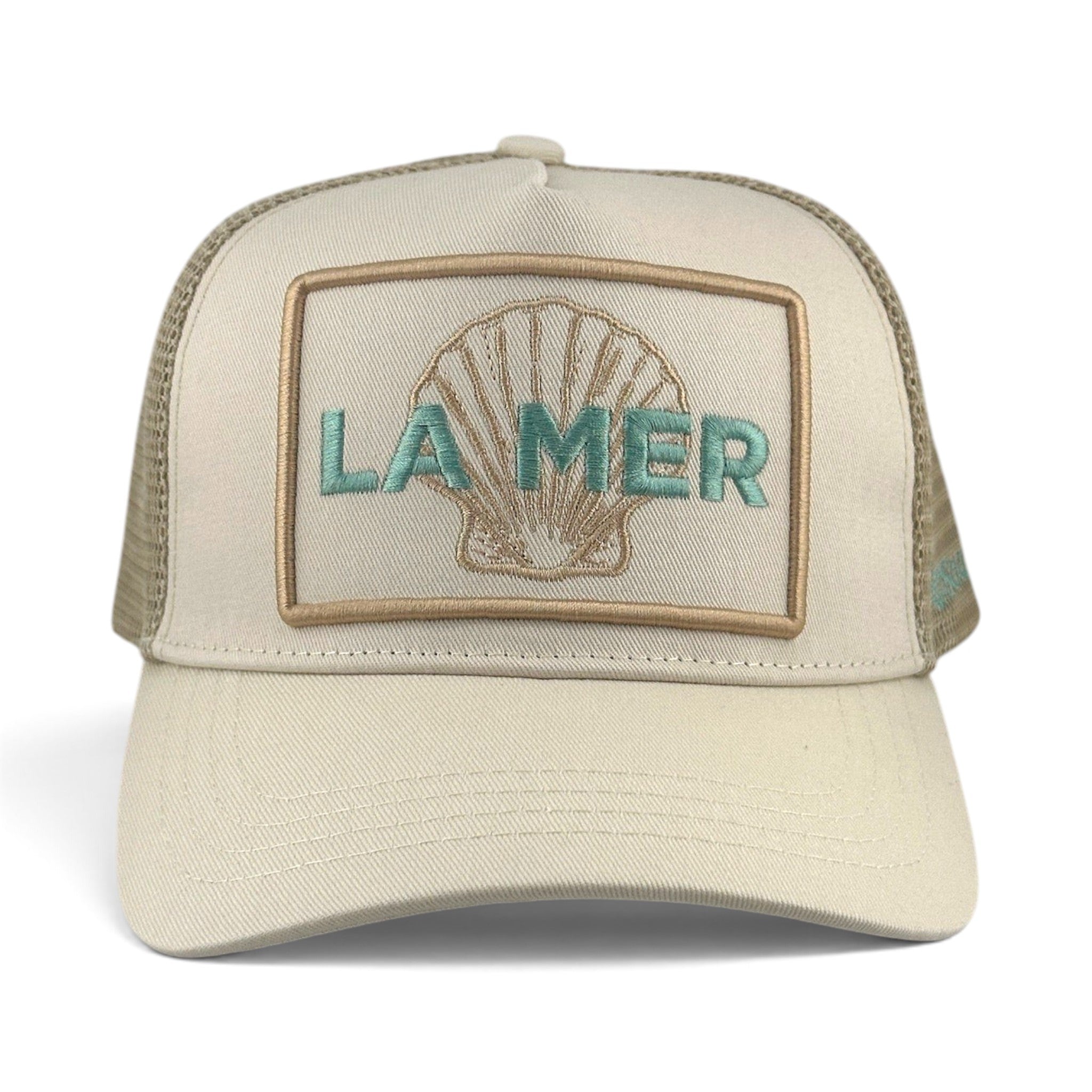 Soulbyrd Wholesale La Mer cream trucker hat with cotton twill front, nylon mesh back, and shell embroidery.