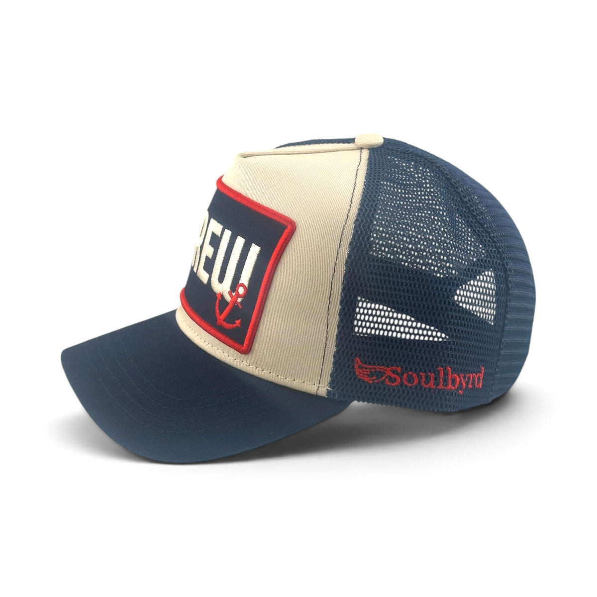 Soulbyrd Wholesale navy and beige 5-panel trucker hat with cotton twill front, mesh back, and CREW anchor patch