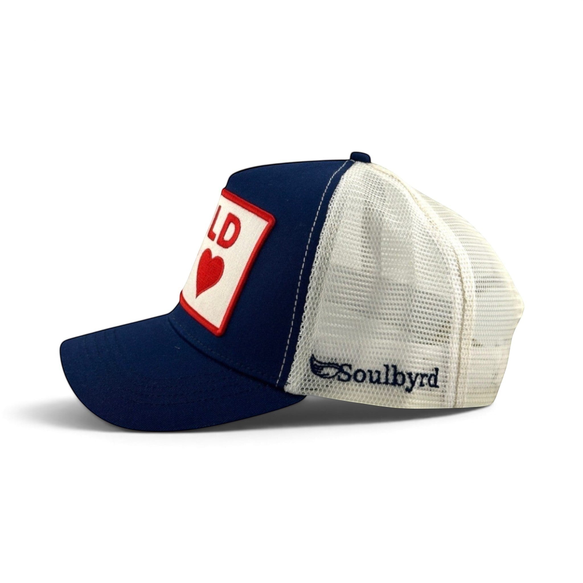 Soulbyrd Wholesale navy cotton and white mesh trucker hat with Wild at Heart patch and side logo embroidery