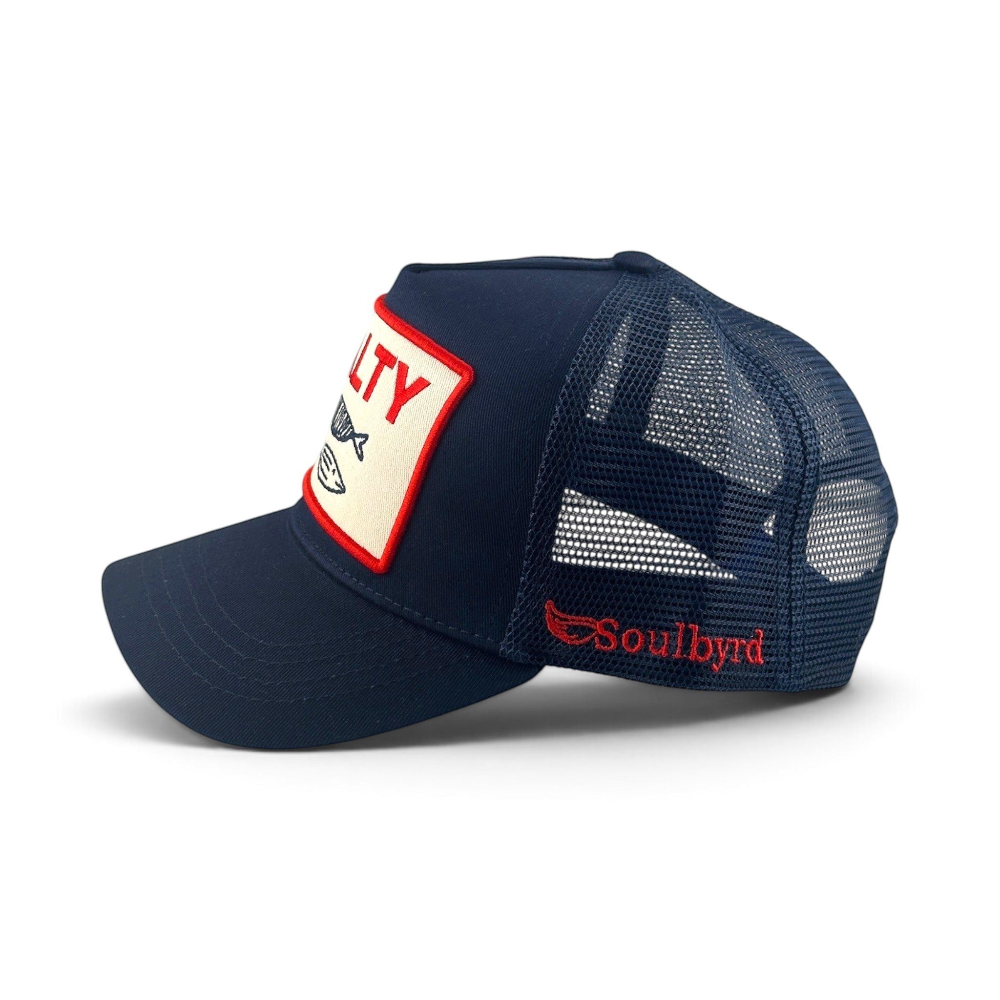Soulbyrd Wholesale navy trucker hat with cotton twill front, mesh back, and Salty patch, side profile view.