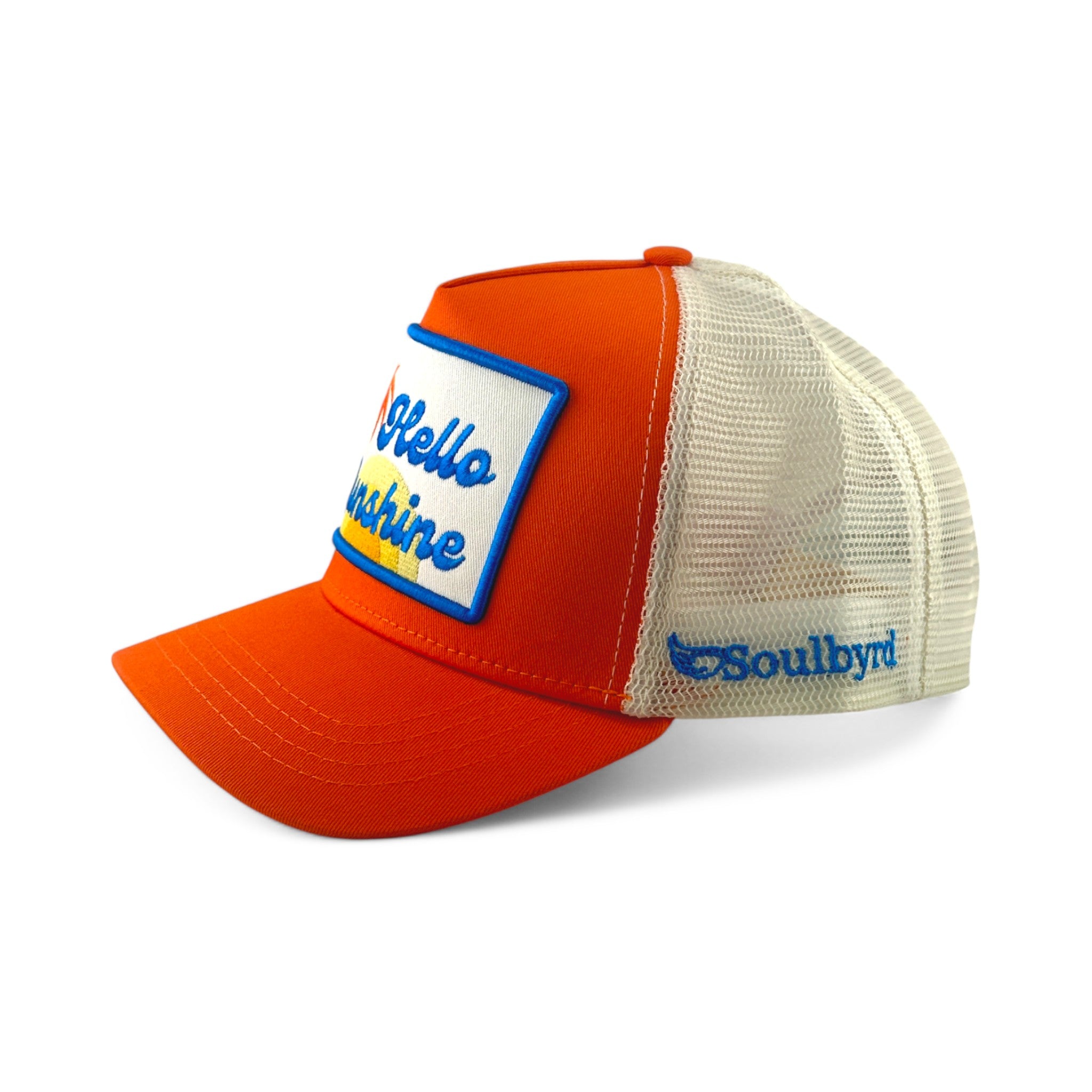 Soulbyrd Wholesale orange trucker hat with Hello Sunshine patch, cotton twill front, and white nylon mesh back.