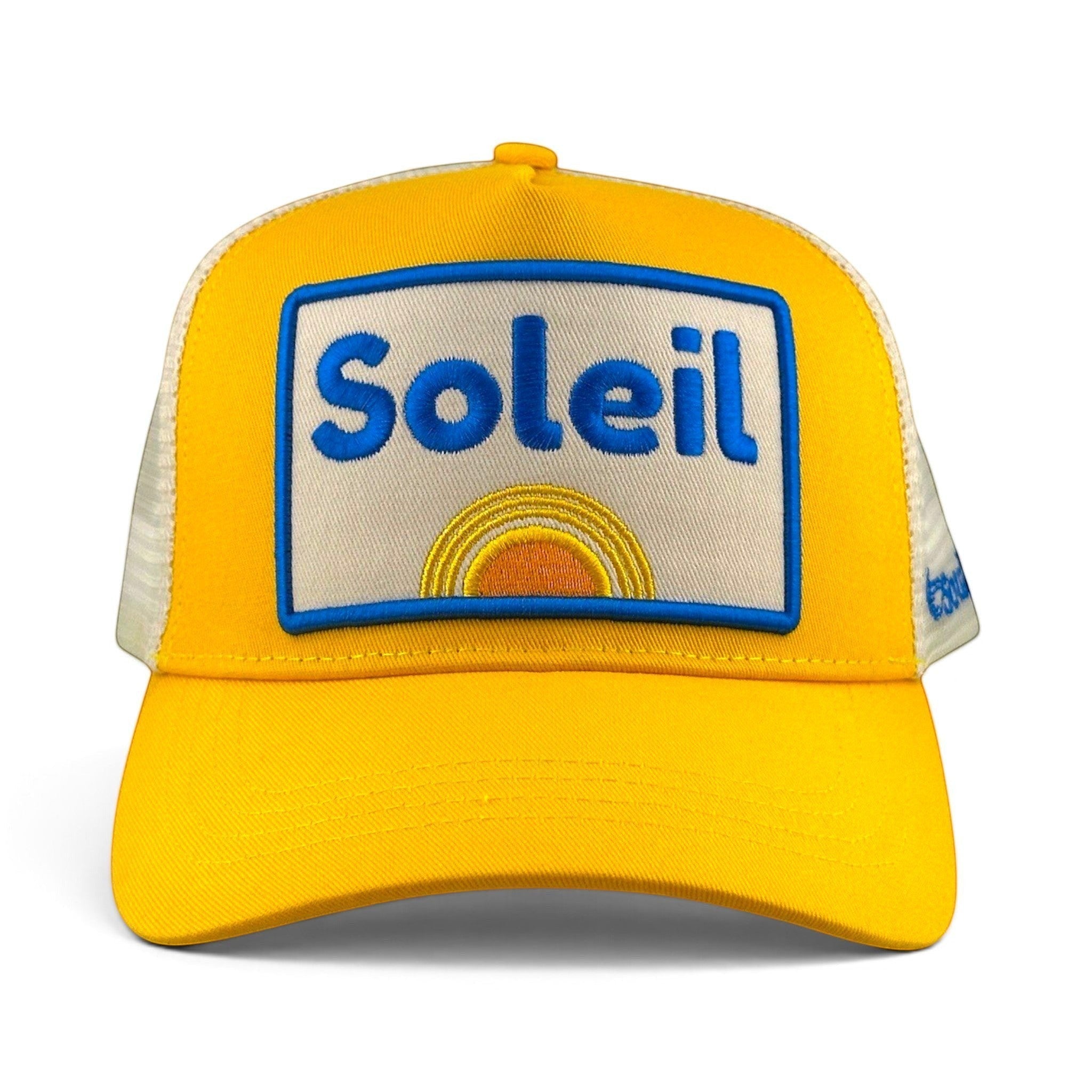 Soulbyrd Wholesale yellow 5-panel trucker hat with white mesh back and Soleil embroidered patch on cotton twill front.
