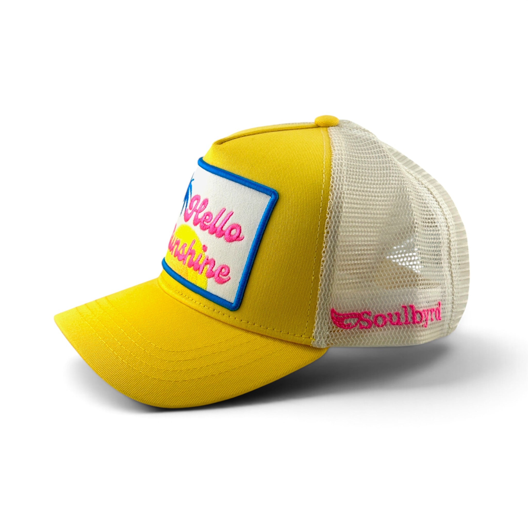 Soulbyrd Wholesale yellow trucker hat with Hello Sunshine patch, cotton twill front, and breathable nylon mesh back.