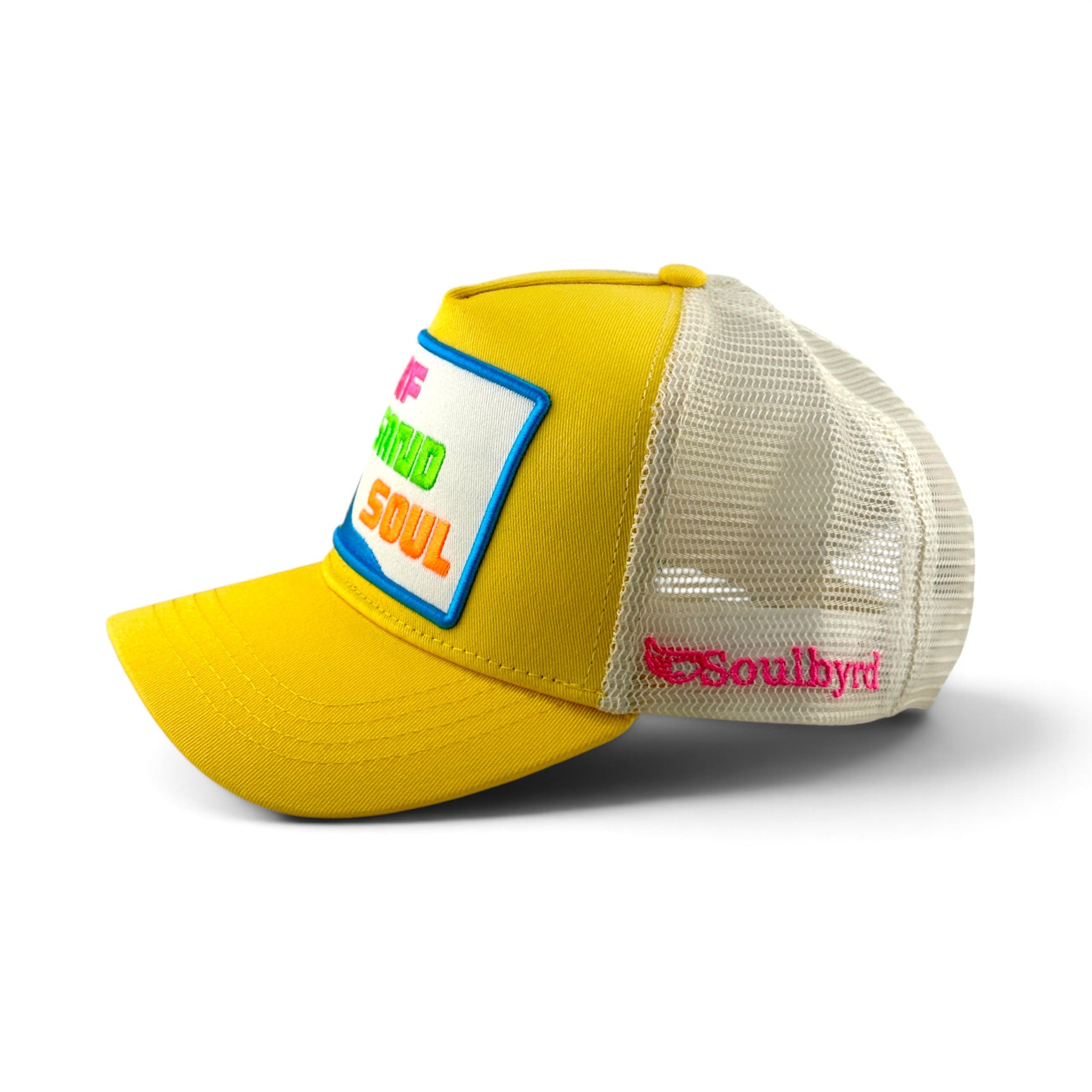Soulbyrd Wholesale yellow 5-panel trucker hat with white mesh back and Surf Sand Soul patch on the front